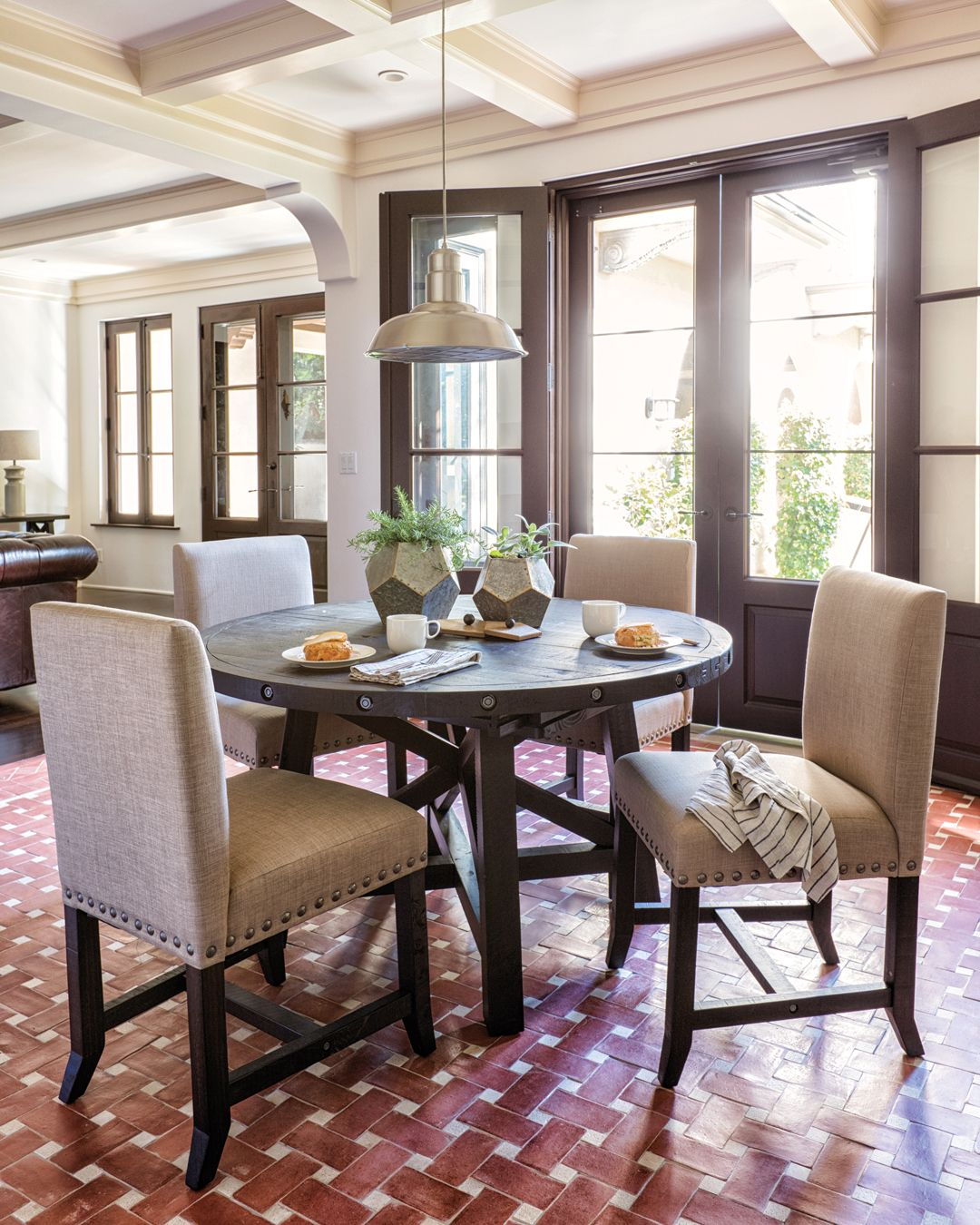 5 Piece Round Dining Set With Upholstered Chairs inside Exploring the Craftsmanship of the Landon 5-Piece Round Dining Set Acorn