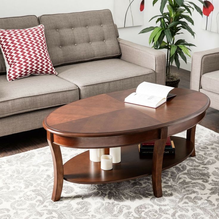 Give Your Living Room A Touch Of Class With This Oval Walnut Coffee ... intended for Why the Pierce Walnut Coffee Table is a Timeless Living Room Centerpiece