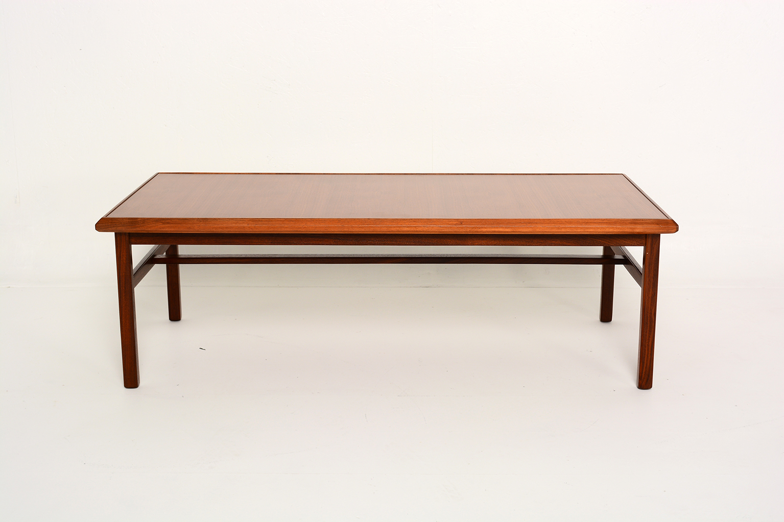 Mid-Century Modern Walnut Coffee Table | Chairish for The Enduring Appeal of Solid Wood The Nola Mid-Century Walnut Coffee Table Story