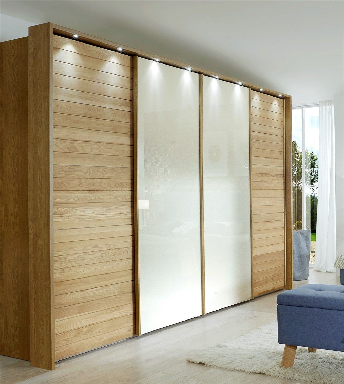 Achieving a Stylish Look with Oak Wide Wardrobes featuring Shutter Doors and Aqua Accents