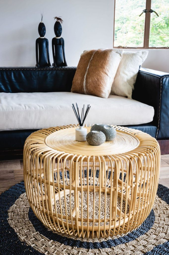 Charcoal Round Coffee Table with Rattan Elements A Guide to Styling