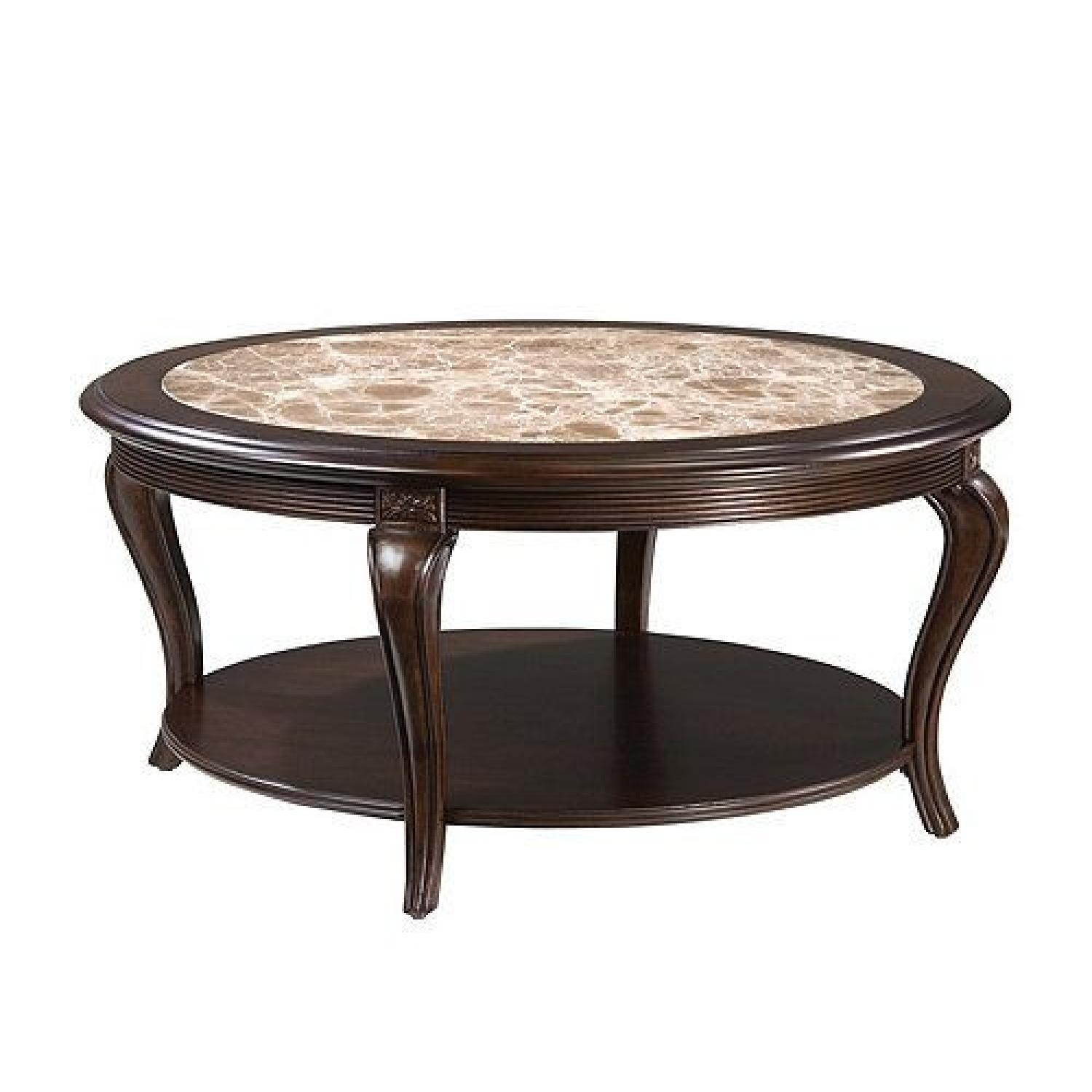 Raymour &amp;amp; Flanigan Round Marble Top Cherry Wood Coffee Table - Aptdeco in A Closer Look at the Miyeon Coffee Table Marble Top Cherry Finish Craftsmanship and Design