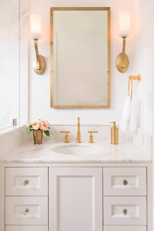 White vanity with matte gold accents natural marble countertops and backsplash in allie 43 combo