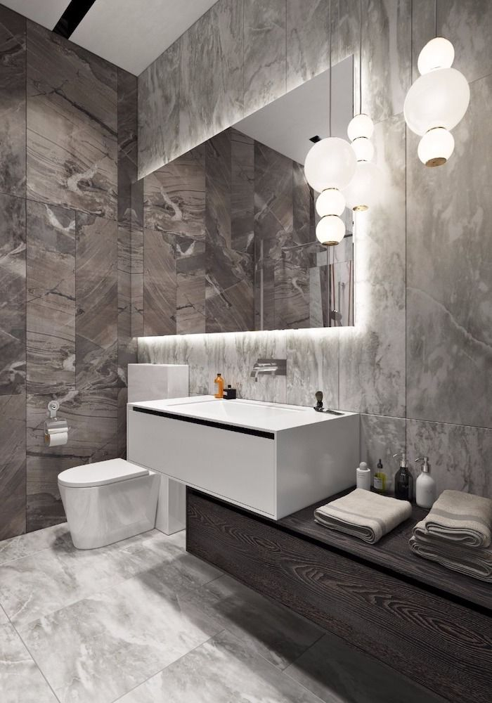 Designing Your Bathroom Space with Dark Gray and White Marble Elements