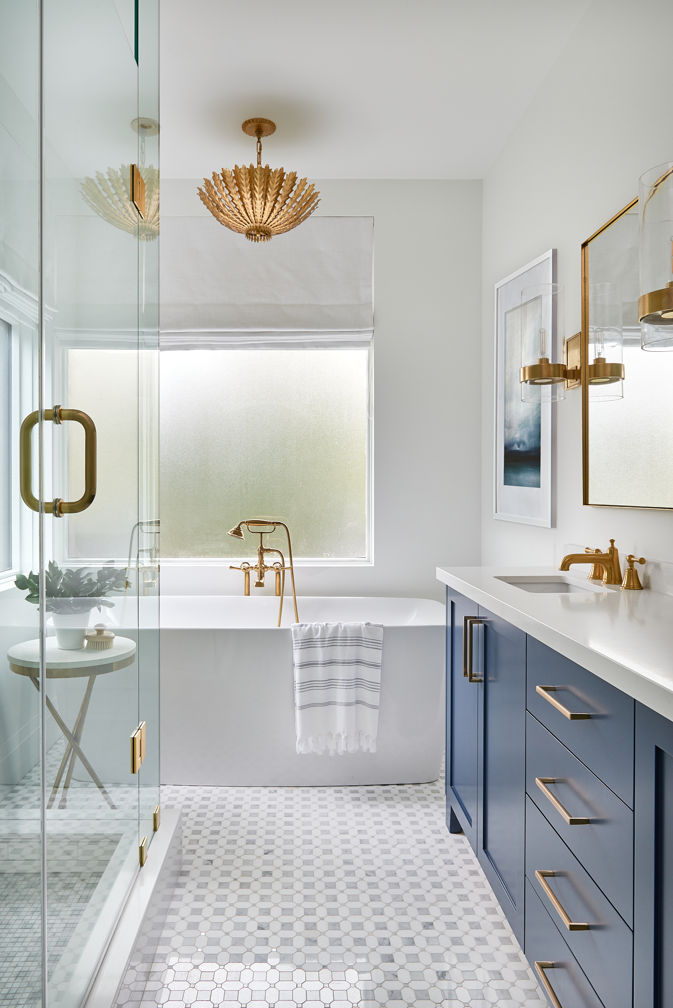 How To Create A Spa-Like Bathroom for Creating a Spa-Like Bathroom with Dark Blue Vanity and Carrara Countertop