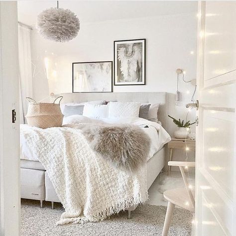 Designing a Cozy White Bedroom Using Layered Lighting and Natural Wood Textures 3