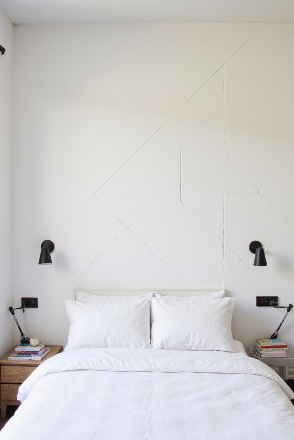 Designing a Cozy White Bedroom Using Layered Lighting and Natural Wood Textures 5